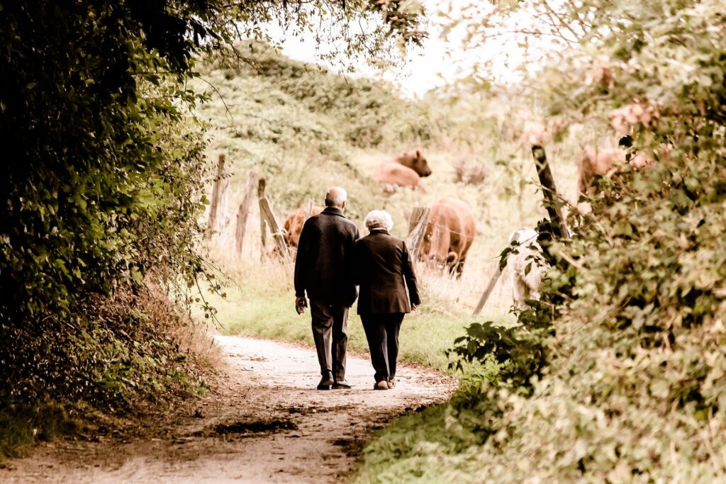 A Couple Walking Down a Path