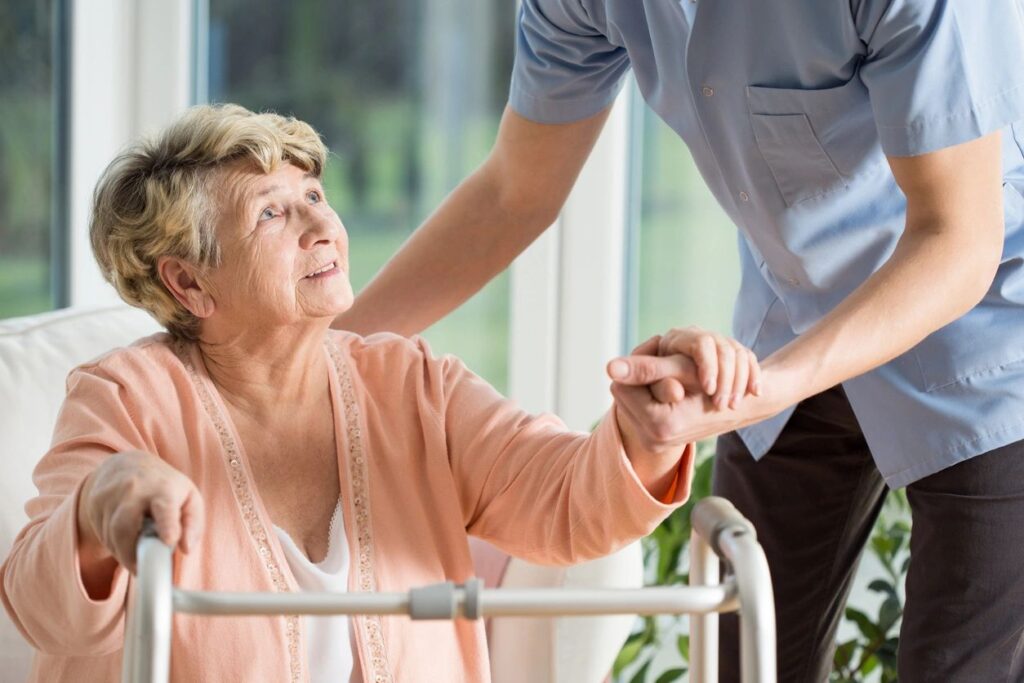 Senior Citizen receiving a helping hand